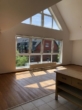 Exklusive "Penthouse" Wohnung mit großer Glasfront, Parkett und Balkon - Wohnbereich