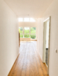 Bild - Exklusive Penthouse Wohnung mit großer Glasfront, Parkett und Balkon