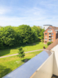 Bild - Exklusive Penthouse Wohnung mit großer Glasfront, Parkett und Balkon